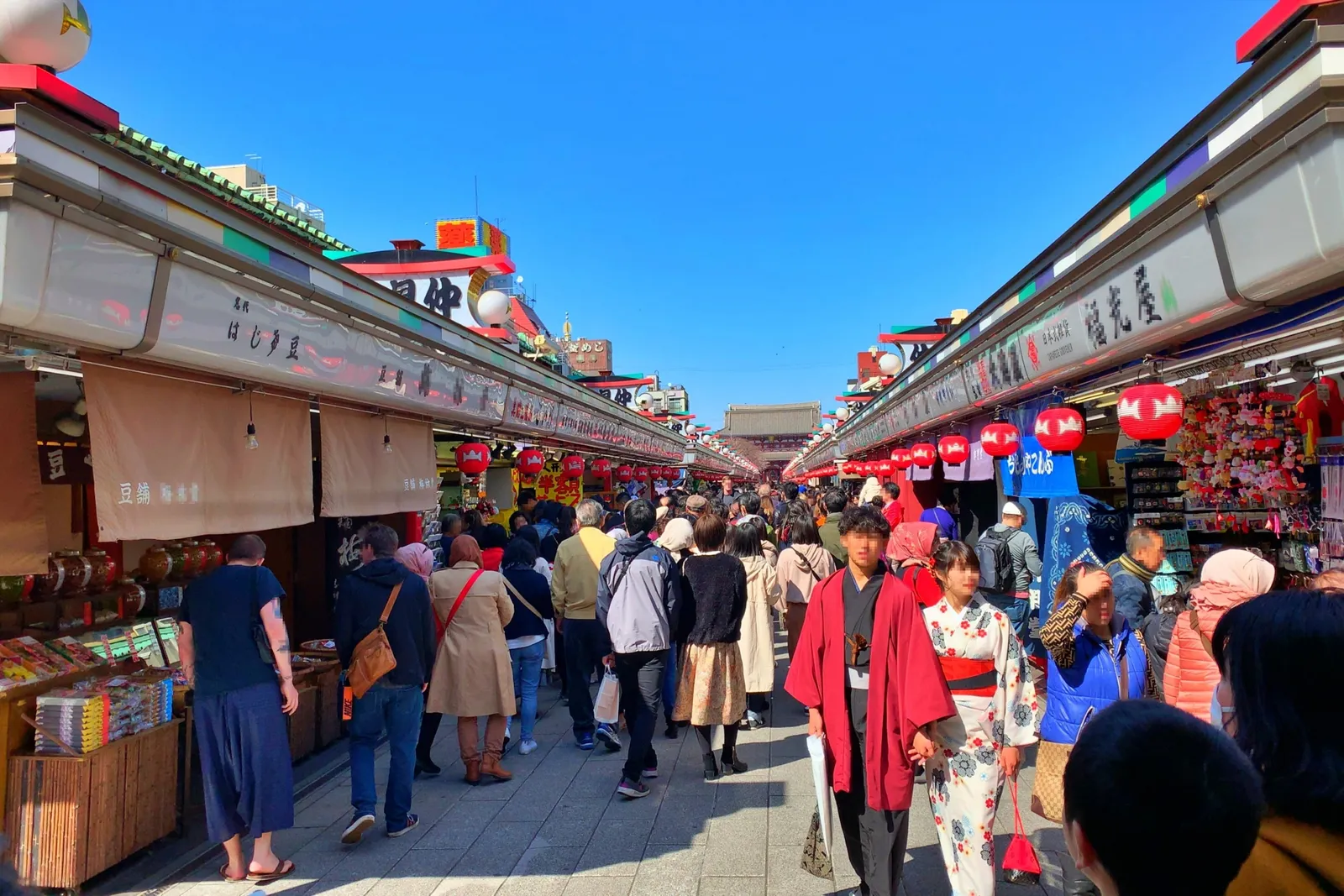 Walking through Asakusa's traditional streets in kimono