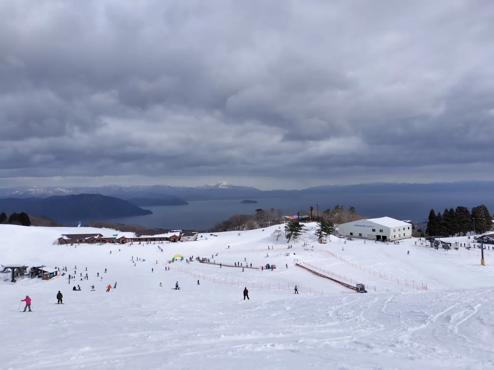 The slopes of Mt. Hakodate Ski Resort, with Lake Biwa stretching out behind